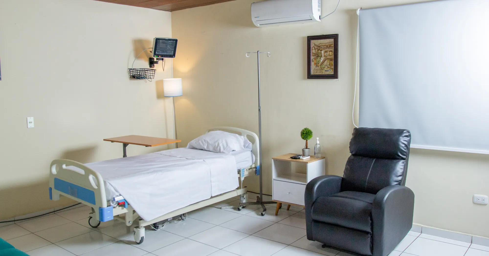 Habitación de OncoCare con sillón para el acompañante